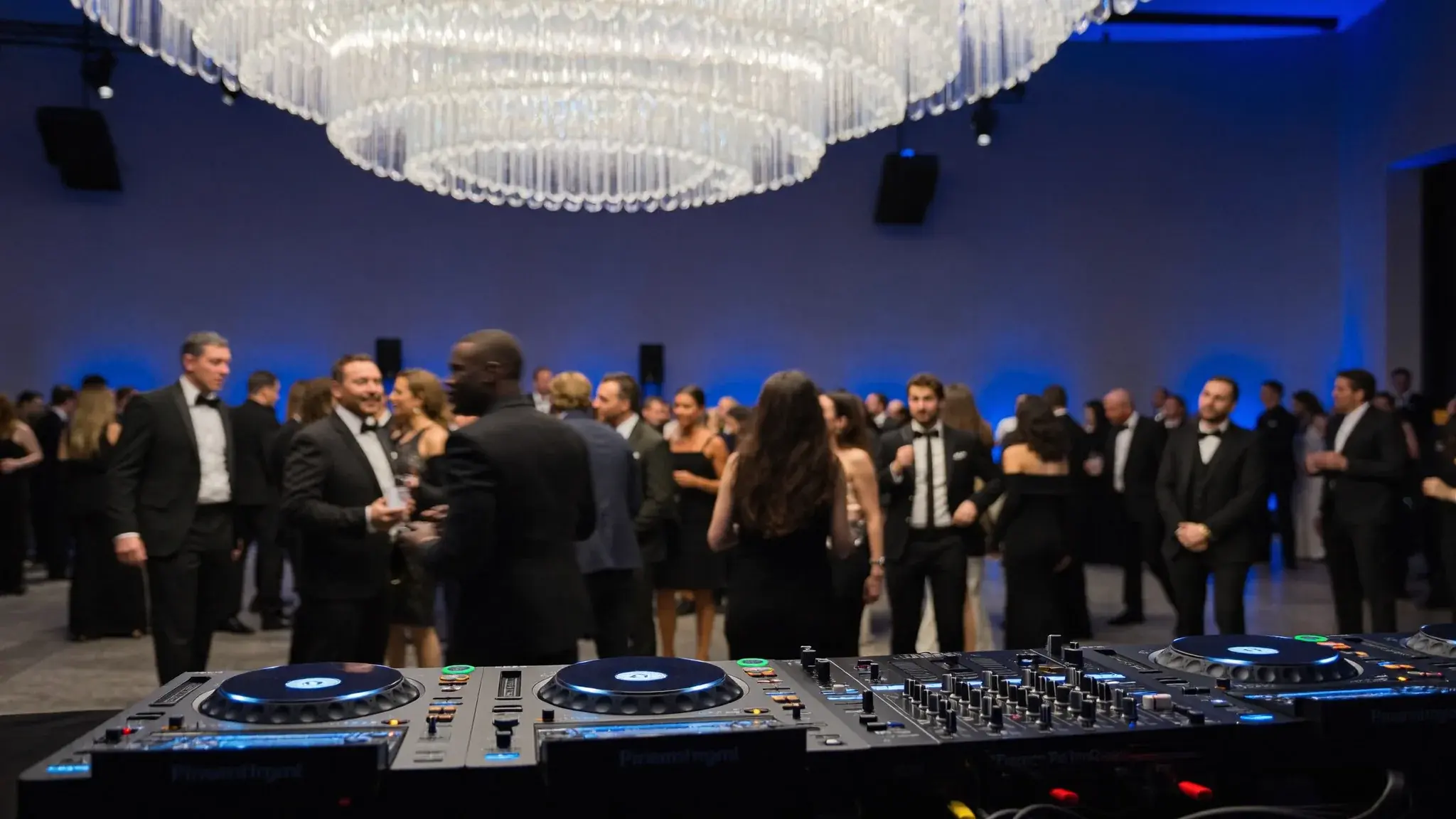 Corporate gala reception with a DJ performing in a ballroom